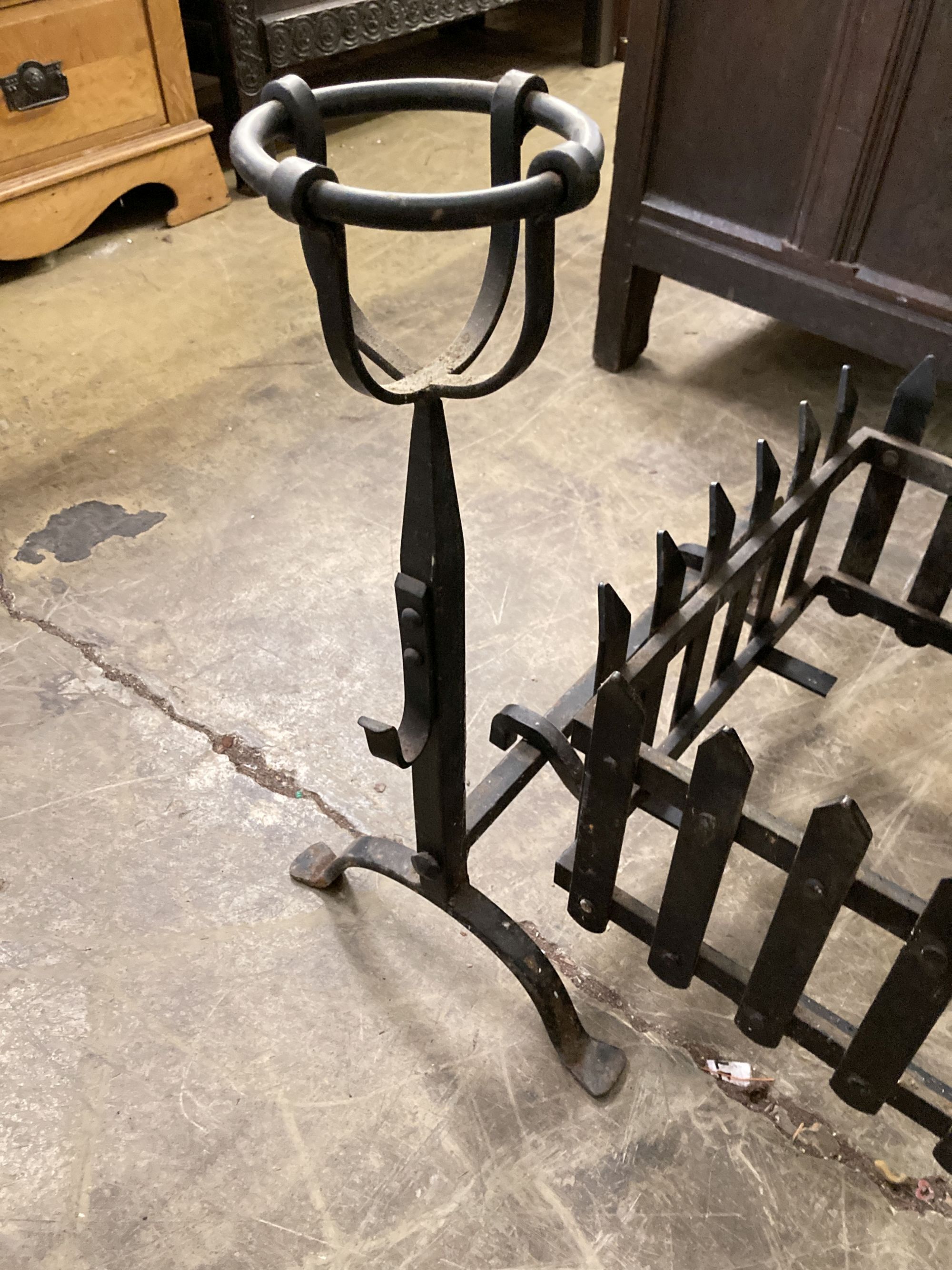 A rectangular wrought iron fire basket, width 114cm, depth 56cm, height 62cm and dogs